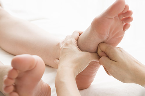 Acupressure Treatment on a Foot